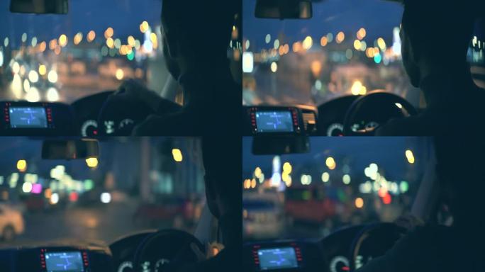 迷人的年轻人在夜城开车