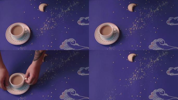 有人从夜空形式的桌子上拿走，一杯咖啡，特写镜头