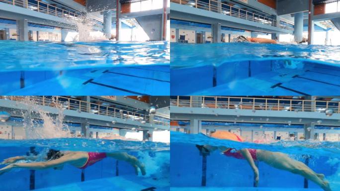 运动员在游泳池游泳蝴蝶风格