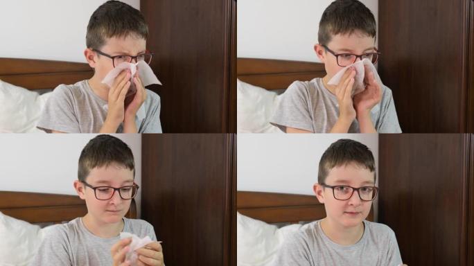 一个患有流感和发热的男孩躺在床上，用纸巾吹鼻子，季节性病毒性疾病的概念