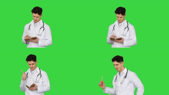 富有创造力的年轻男性医生开始在绿色屏幕上跳舞，色度键