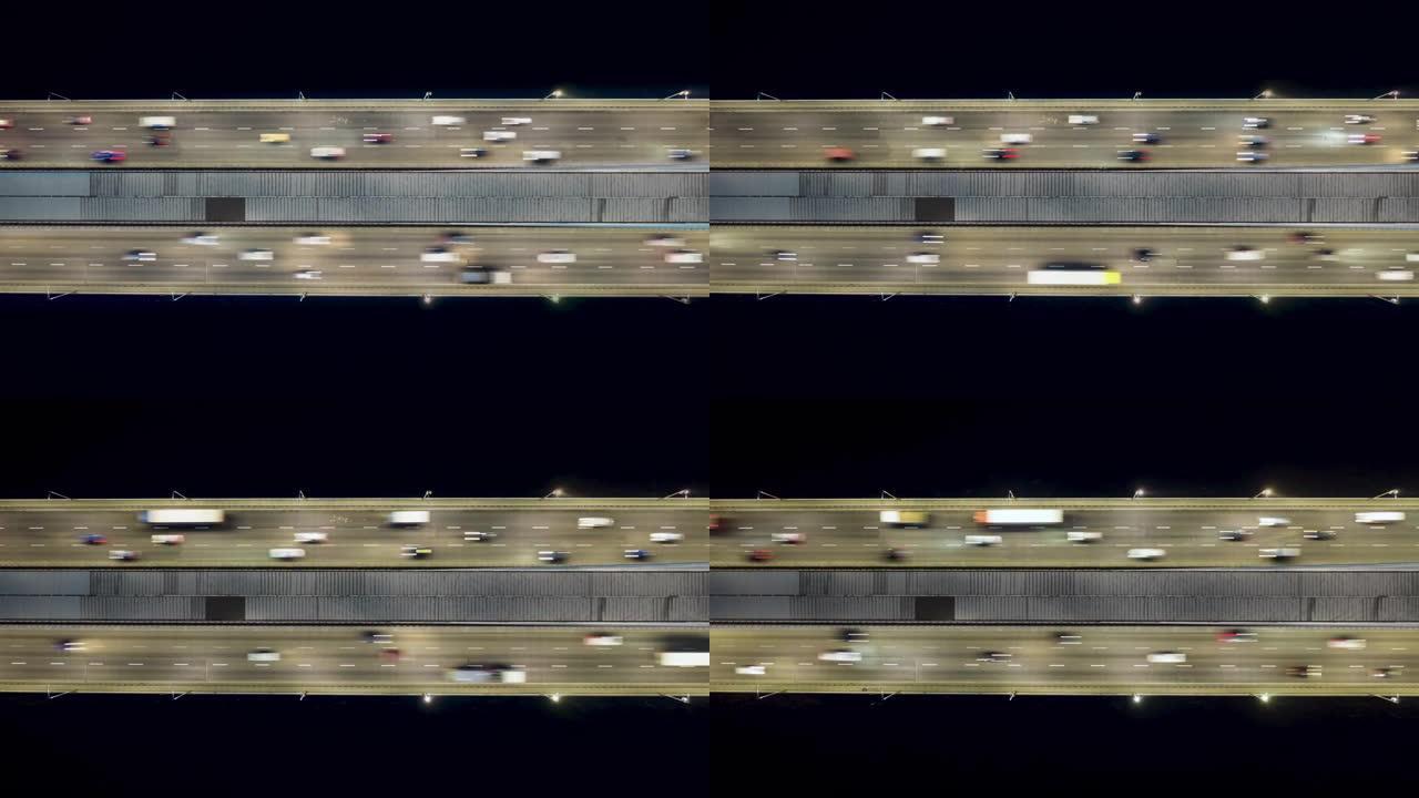 上升的无人机镜头揭示了壮观的高架公路，桥梁，交通