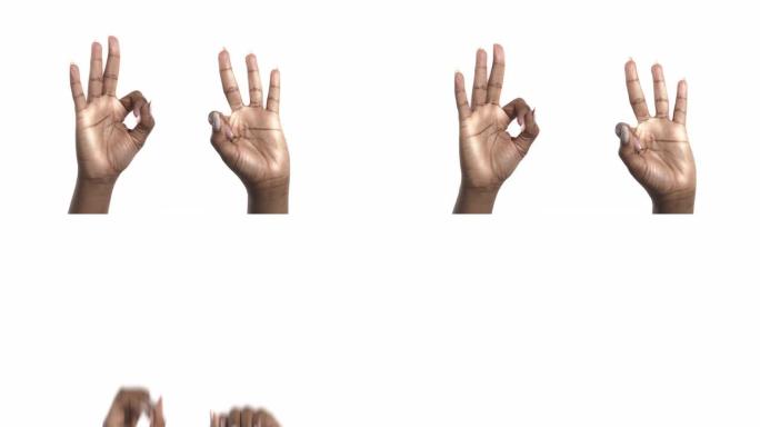 非洲妇女用双手在白色背景上展示ok标志。肢体语言概念