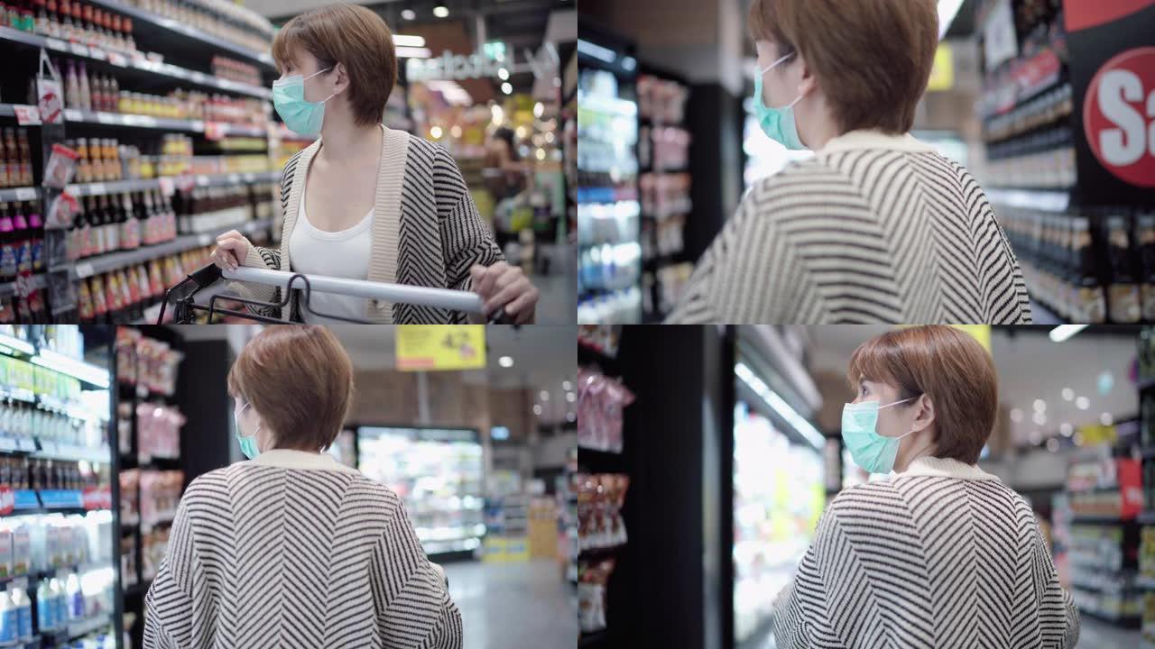 年轻女子在超市购物，带面罩保护