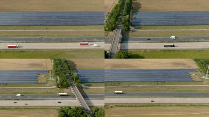 高速公路旁带有太阳能电池板的广阔视野的空中全景