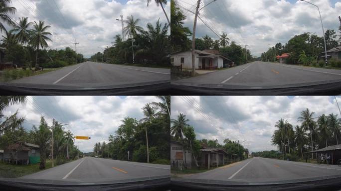 汽车行驶时乡村道路的前视图