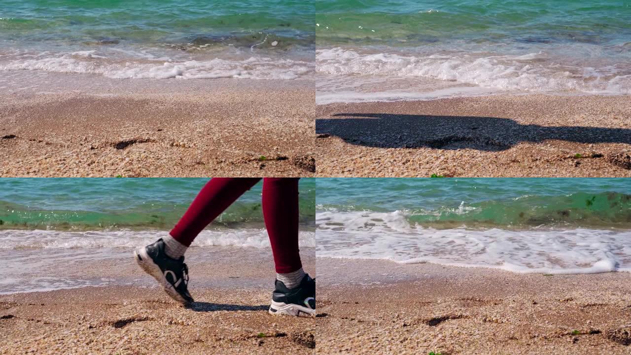 在海边或海边的海滩上踩着运动鞋