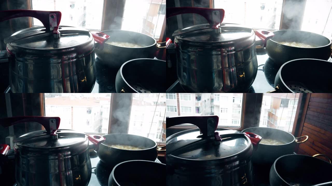 烤箱上的锅碗瓢盆，在厨房里做饭