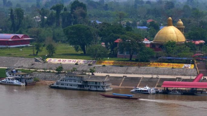 泰国，金三角泰国金山角金色塔顶船只河流