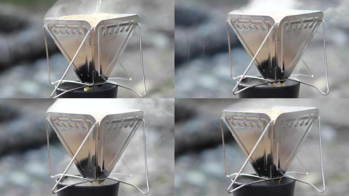 杯子里滴咖啡的特写。