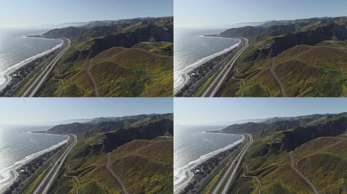 风景秀丽的文图拉高速公路上的交通101沿着太平洋海岸附近的艾玛伍德州立海滩和索利马尔，加利福尼亚州，