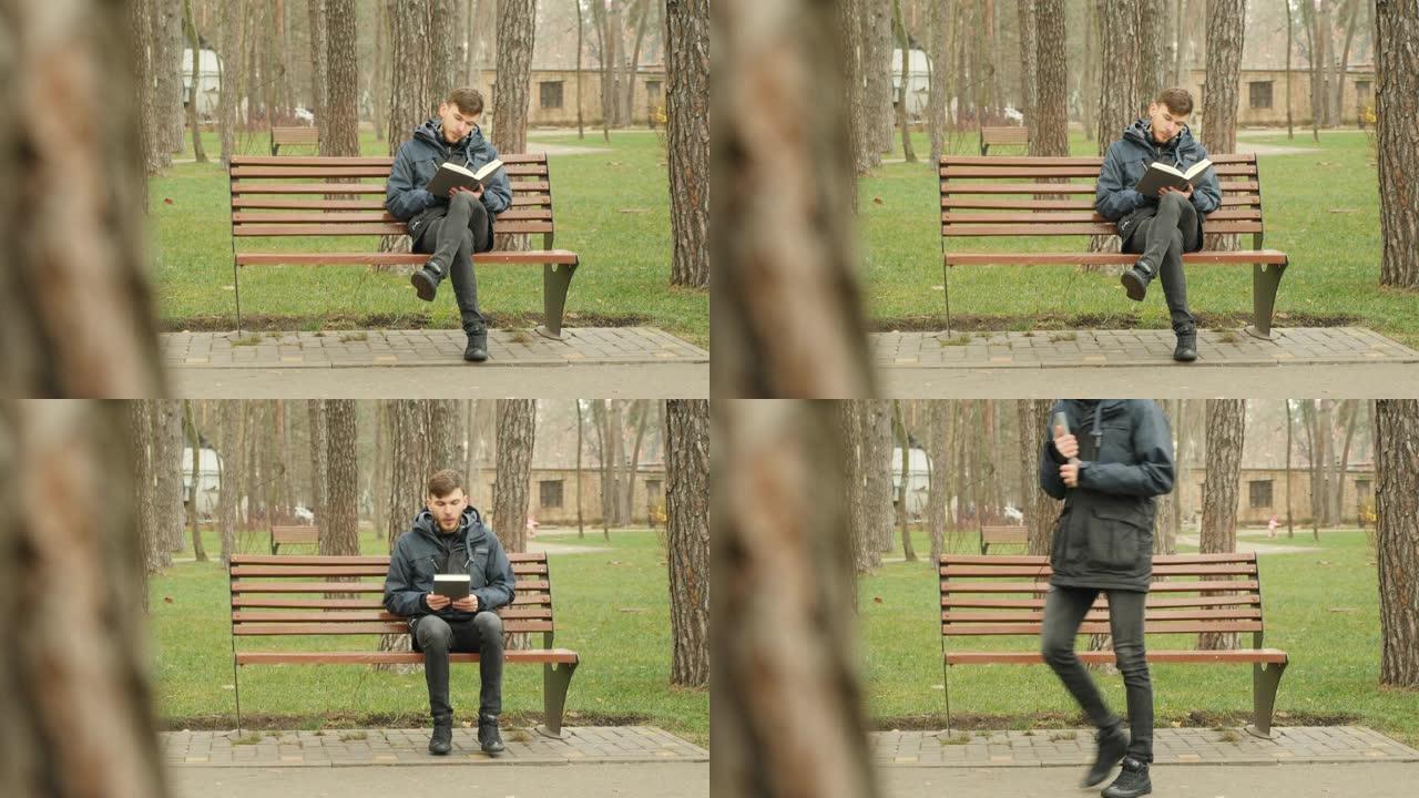 年轻的大胡子男人在秋季公园读完一本书，从长凳上站起来，离开其他地方。阅读概念
