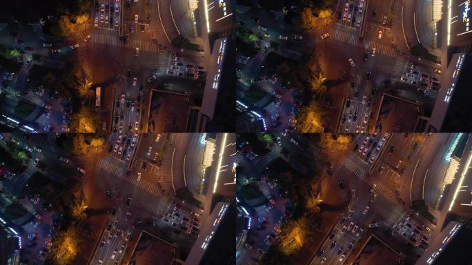 青岛市暮光之夜照明市中心交通街十字路口空中俯拍全景4k中国
