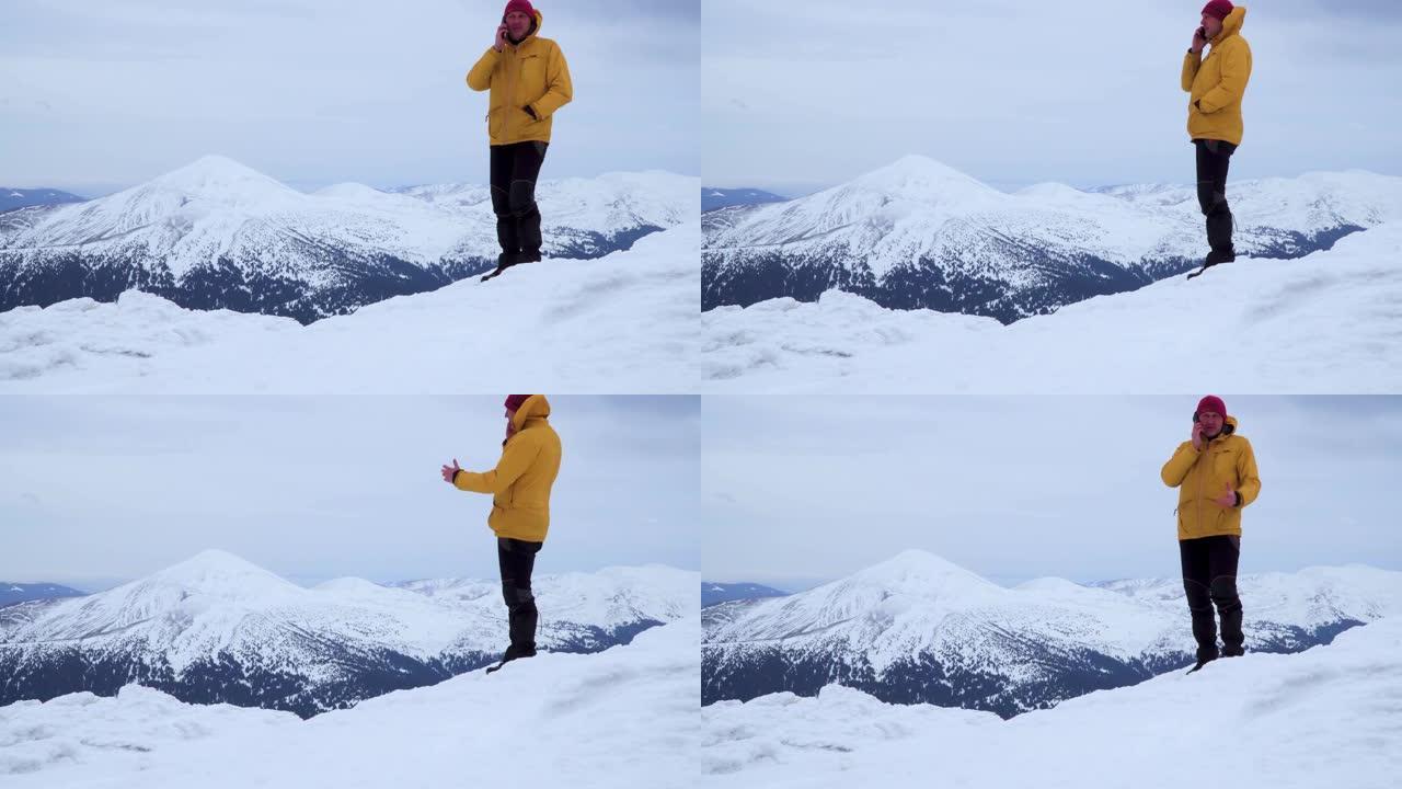 冬天，一个旅行者在山区打电话