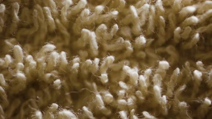 米色毛巾毛线。微距材质