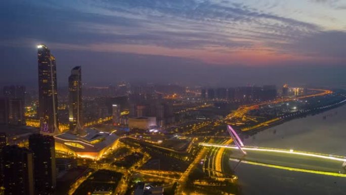 日落天空南京市国际青年文化中心河畔人行天桥空中延时全景4k中国