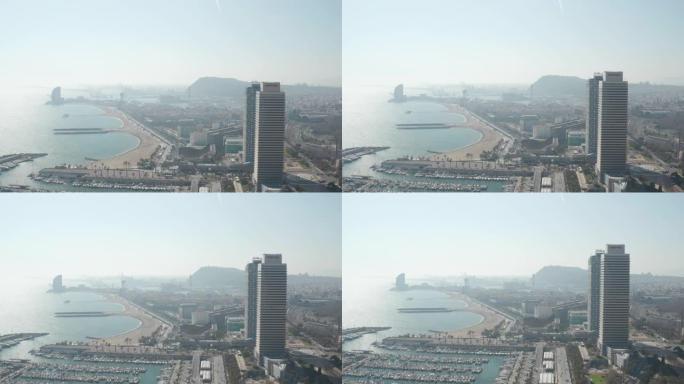 空中: 西班牙巴塞罗那宽无人机拍摄城市和海洋中的船只在海湾 [4K]