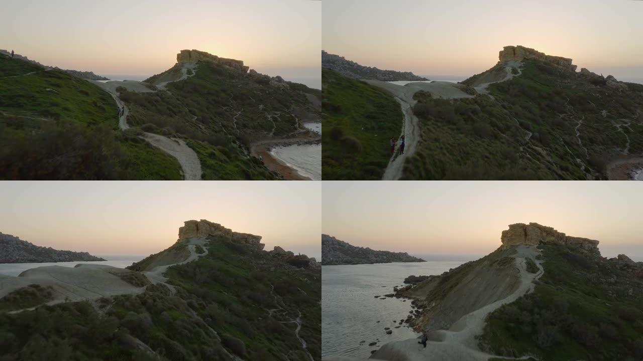 自然景观的鸟瞰图。地中海Ghajn Tuffieha海滩。摄像机向前移动到日落的天空。马耳他国家