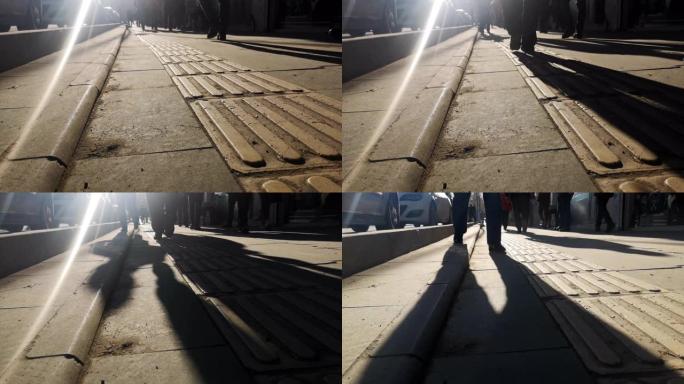 人行道上的一个人的影子