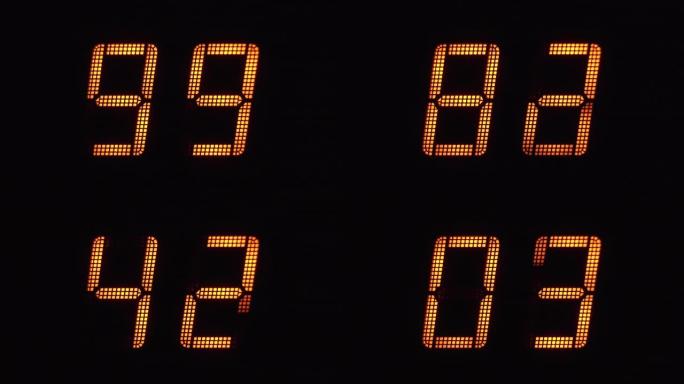 电子显示屏上橙色数字的快速数字倒计时，从99到0