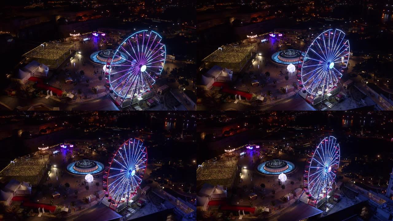 瓦莱塔市摩天轮的空中俯视图。晚上，晚上。欧洲。马尔他岛