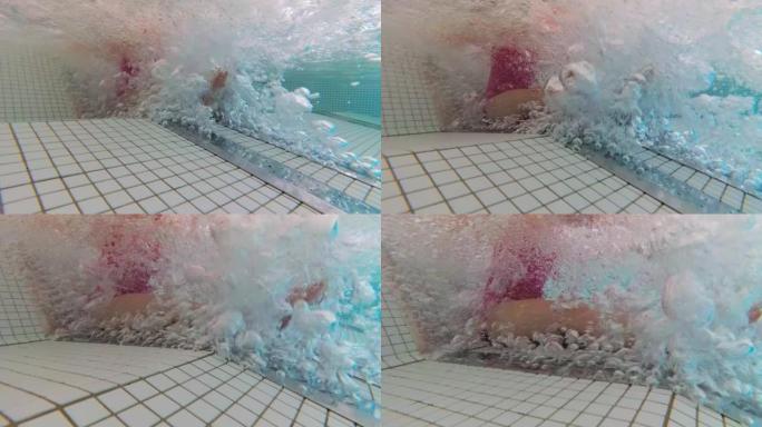 水疗池中女孩在喷水热水浴缸气泡中放松的水下视图