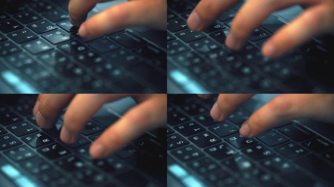 妇女的手在笔记本电脑键盘上打字