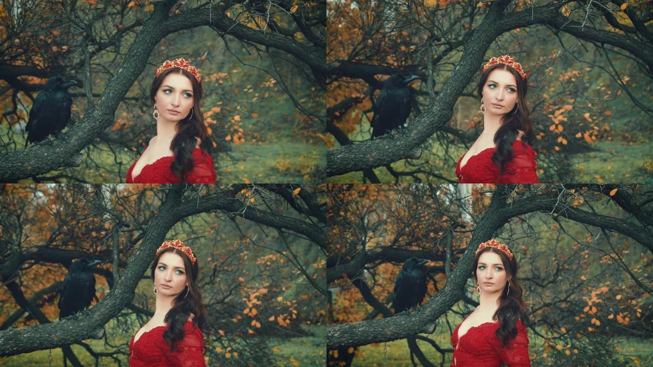 肖像漂亮的黑发女人，手里拿着巨大的黑色乌鸦。女王的形象，红色连衣裙，优雅的发型，金色皇冠和红宝石耳环