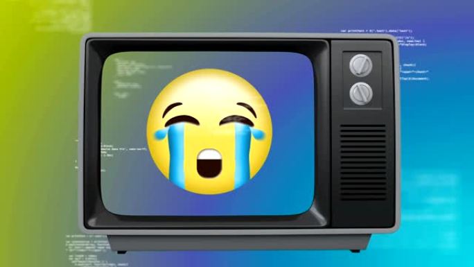 屏幕上带有哭泣表情符号的旧电视的前视图