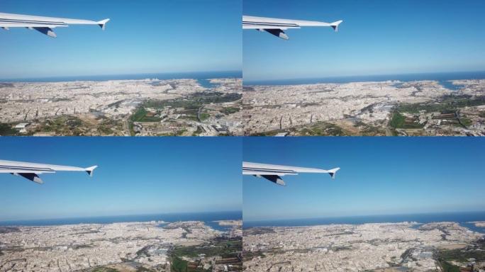 从上面看马耳他岛。从飞机上看，机翼。欧洲。地中海