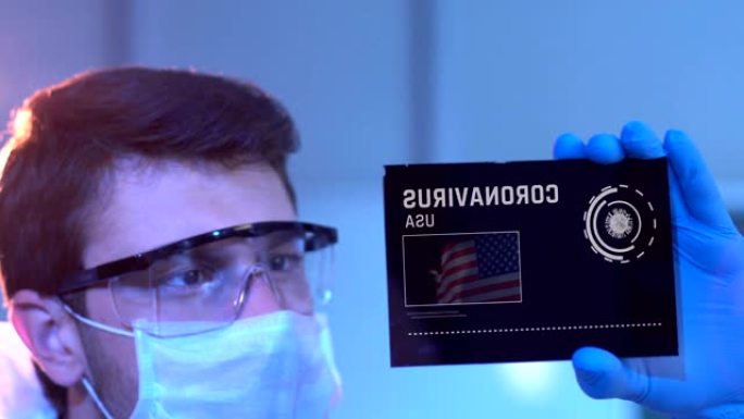研究人员正在研究美利坚合众国的冠状病毒结果。实验室数字屏幕上的美国国旗