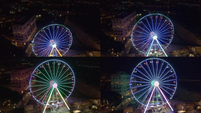 瓦莱塔市摩天轮的空中俯视图。晚上，晚上。欧洲。马耳他