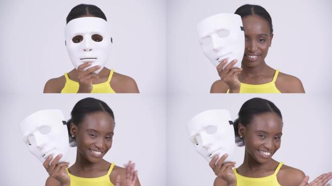 戴着面具的快乐年轻美丽非洲女人的脸