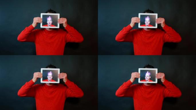平板电脑屏幕上一个人的肖像。
