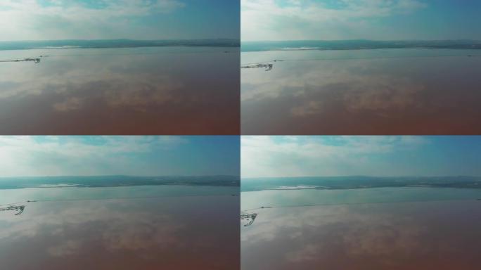 鸟瞰图。在Torrevieja的萨利纳斯 (Salinas) 周围飞行-盐湖是整个欧洲的盐分提取