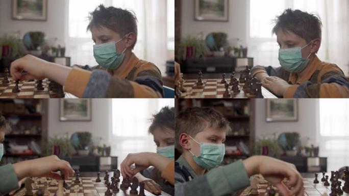 小男孩在病毒爆发时一起下棋