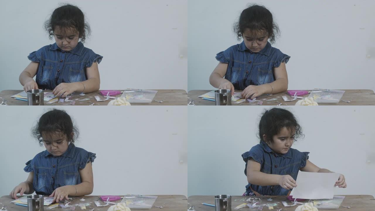 小女孩制作工艺品做手工的小孩学前教育开拓