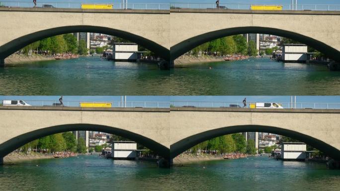 苏黎世市中心夏季河著名桥游泳区慢动作全景4k瑞士