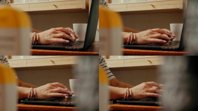 女性自由职业者在键盘上打字，在家工作