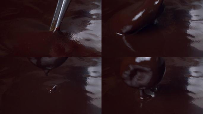 将杏干浸入液体巧克力中