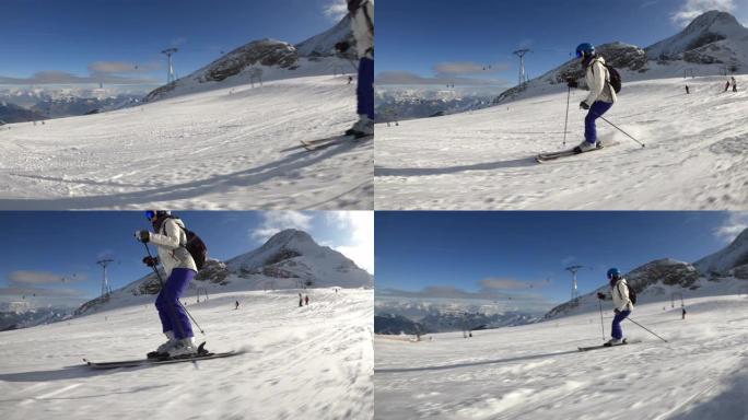 女人在阿尔卑斯山的冰川上滑雪