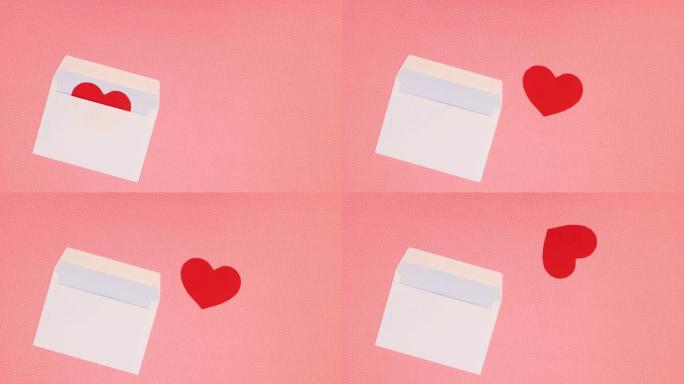 情人节的红心从白色信封中出来-停止运动