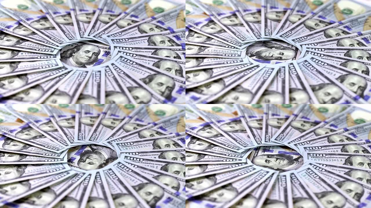 现金100美元旋转的特写镜头，在平铺构图的中心是富兰克林总统的肖像