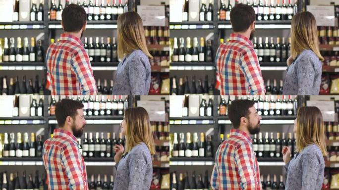 恋爱中的白人年轻夫妇在商店中选择豪华葡萄酒的后视图。男人和女人站在架子前喝酒，互相看着对方，微笑着，