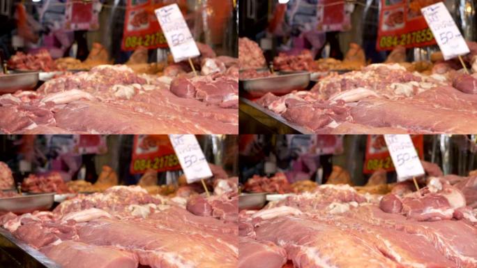 泰国露天市场上带有自动苍蝇的新鲜肉类