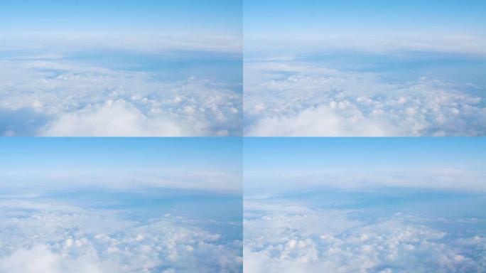 从飞机的窗户看天空中的白云