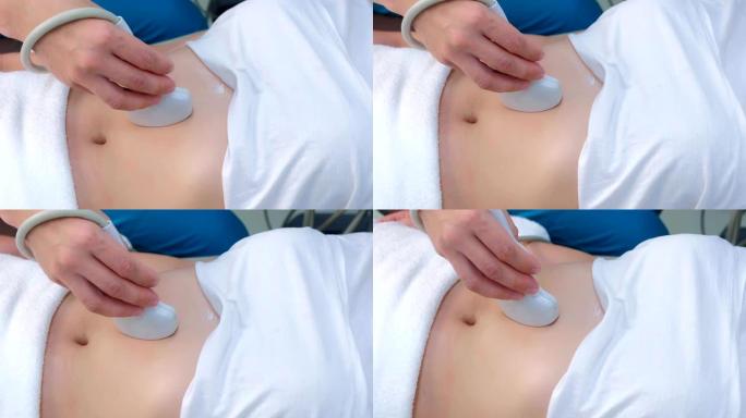 腹部超声对女性进行腹部超声诊断，特写。