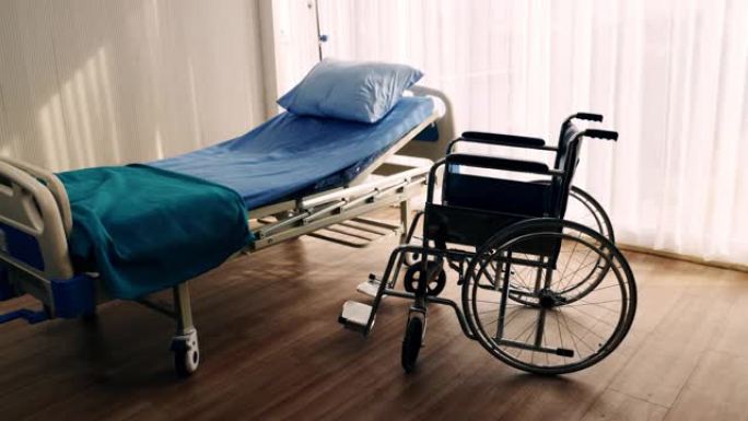 医院病人的卧室，医院病房的空床和轮椅