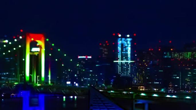 东京城市城市的微型彩虹桥的夜晚时光倒流