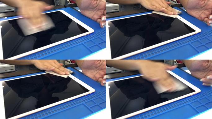 数字平板电脑的女性手屏保护膜